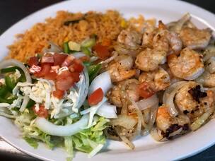 Buffalo New York Mexican Food - Shrimps cooked in a garlic sauce and onion served with rice and salad!